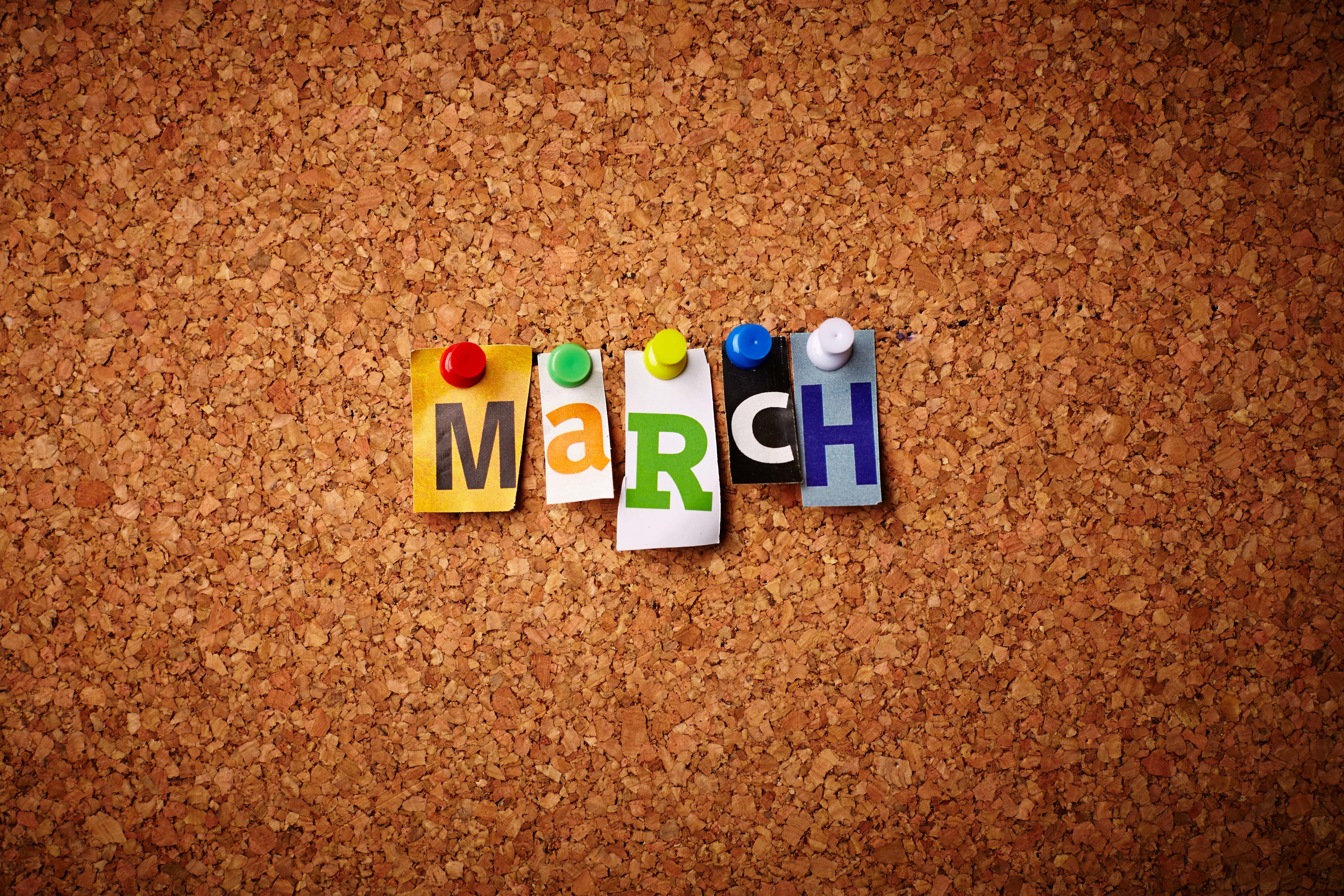 March - Cut out letters pinned on a notice board.